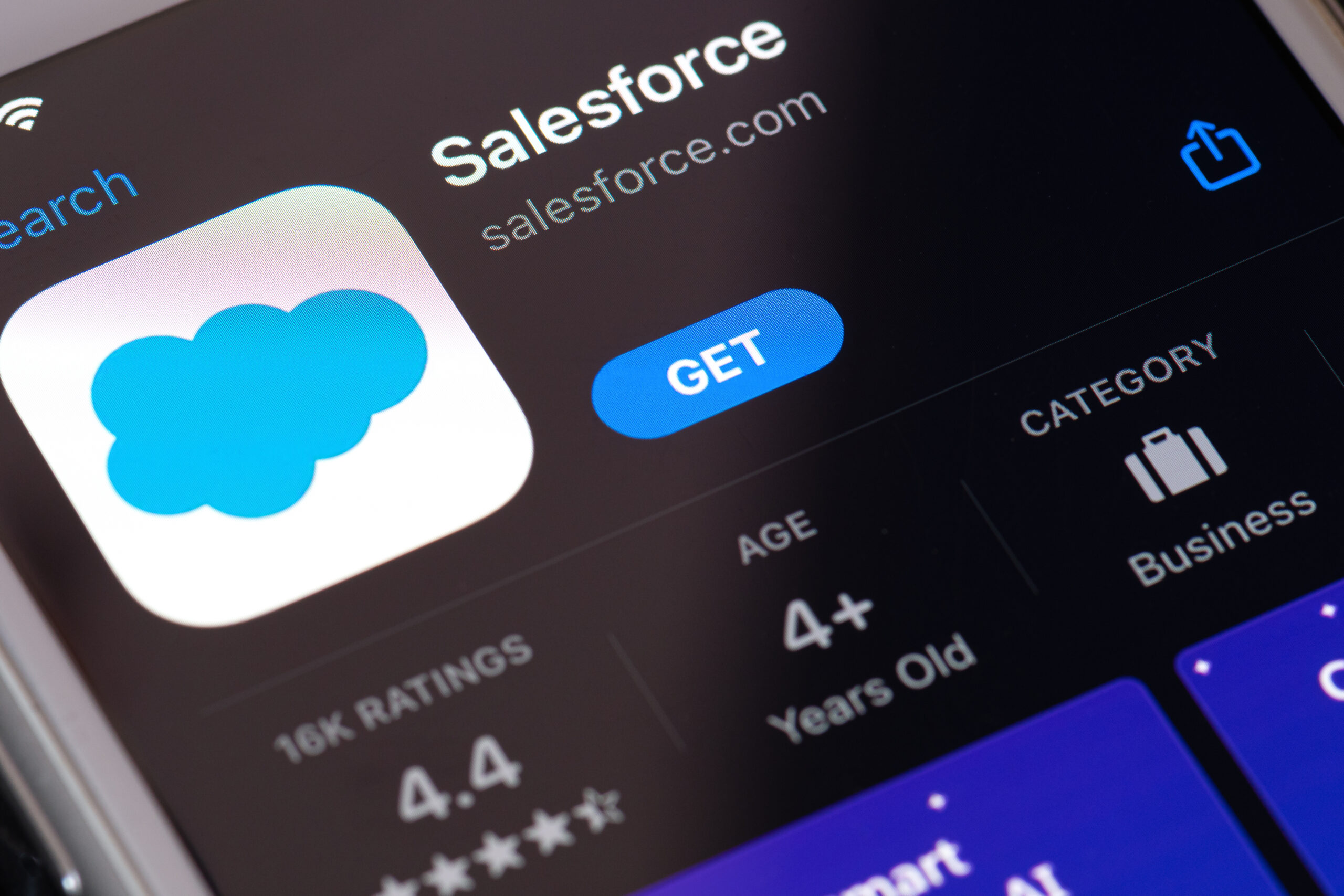 Guilherand-Granges, France - February 08, 2021. Smartphone with Salesforce app logo. American cloud-based software company that provides customer relationship management (CRM) service.